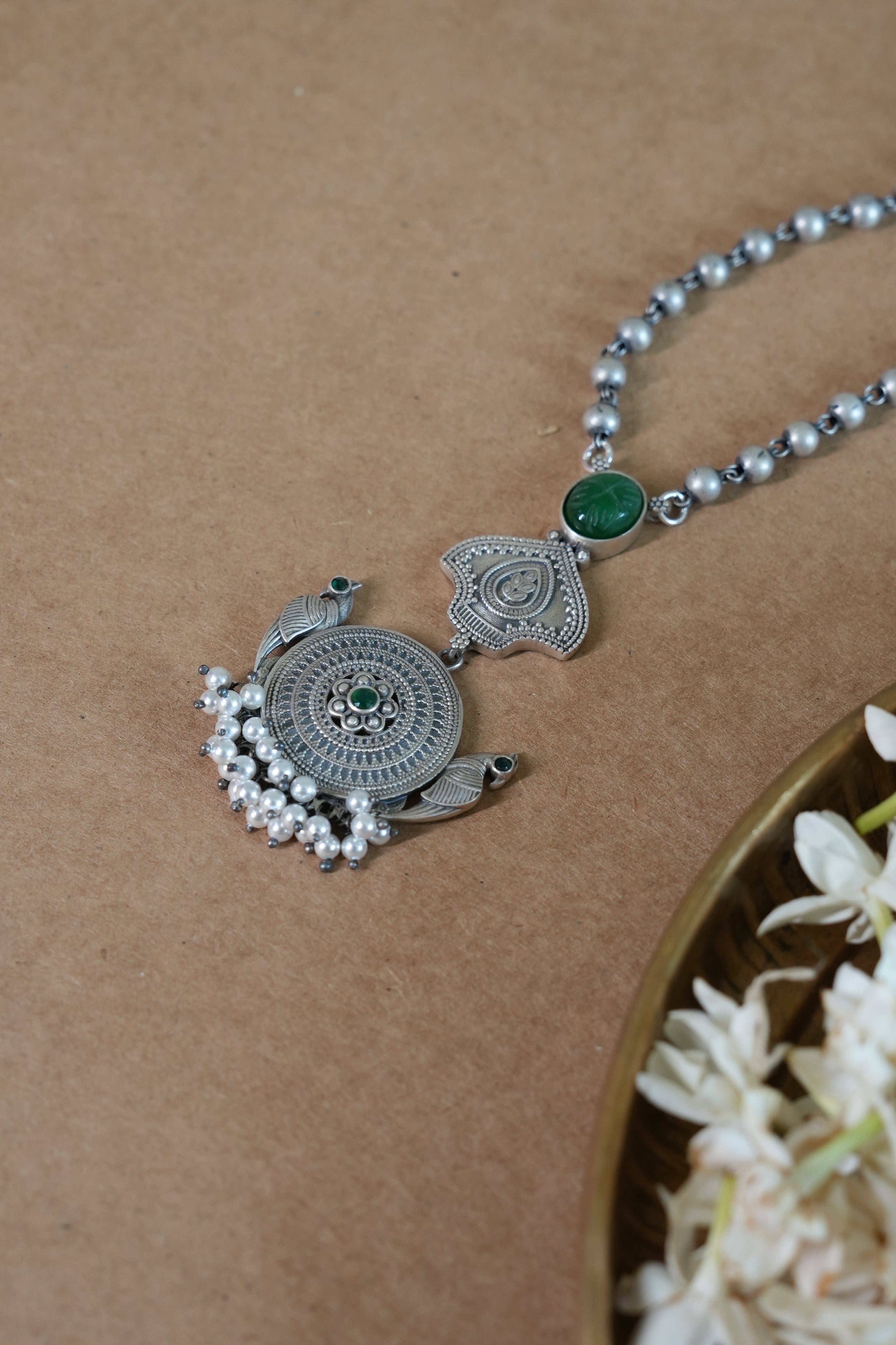 Temple-Inspired Oxidised Silver Pendant with Carved Green Stone